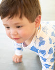 Little Boy crawling in Heyward House Blue Dog Silhouette Long Sleeve Romper