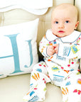 Baby Boy sitting in Heyward House Pima Farmer's Market Playsuit