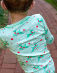Mint green two-piece pajama set with vintage Christmas reindeer pattern made with pima cotton with details