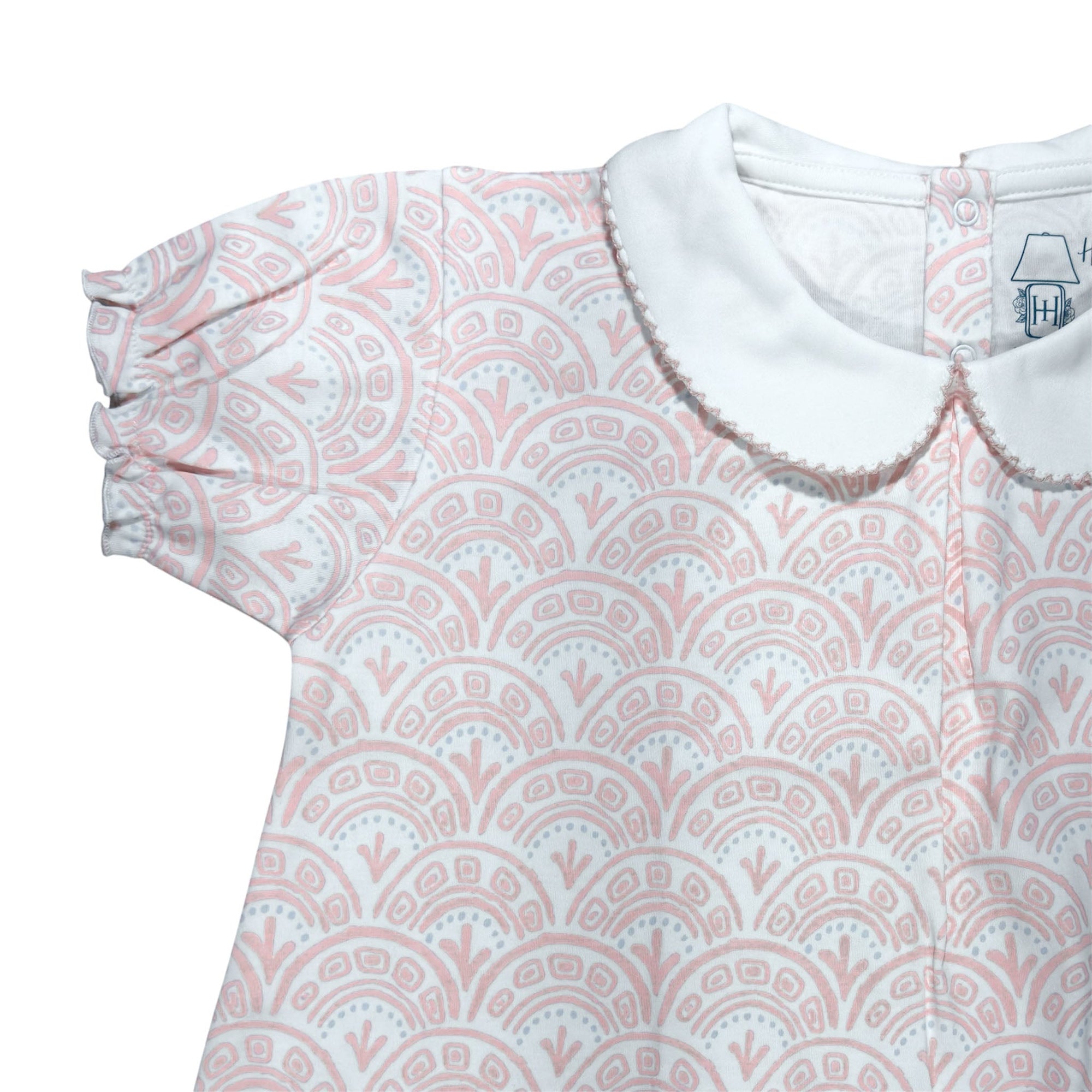 Pink Scallop outfit featuring charming and playful prints.