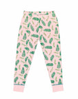 Pink two-piece pajama bottoms with vintage Christmas holly pattern made with pima cotton