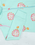 Detail of zipper area of pink footed pajama with hot air balloon pattern made in pima cotton