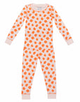 Pink two-piece pajama set with orange polka dot pattern made with pima cotton