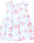 back view white girls dress with smock and vintage-inspired baby carriage pattern made in pima cotton