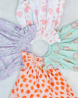 Various Colors of smocked dresses by Heyward House