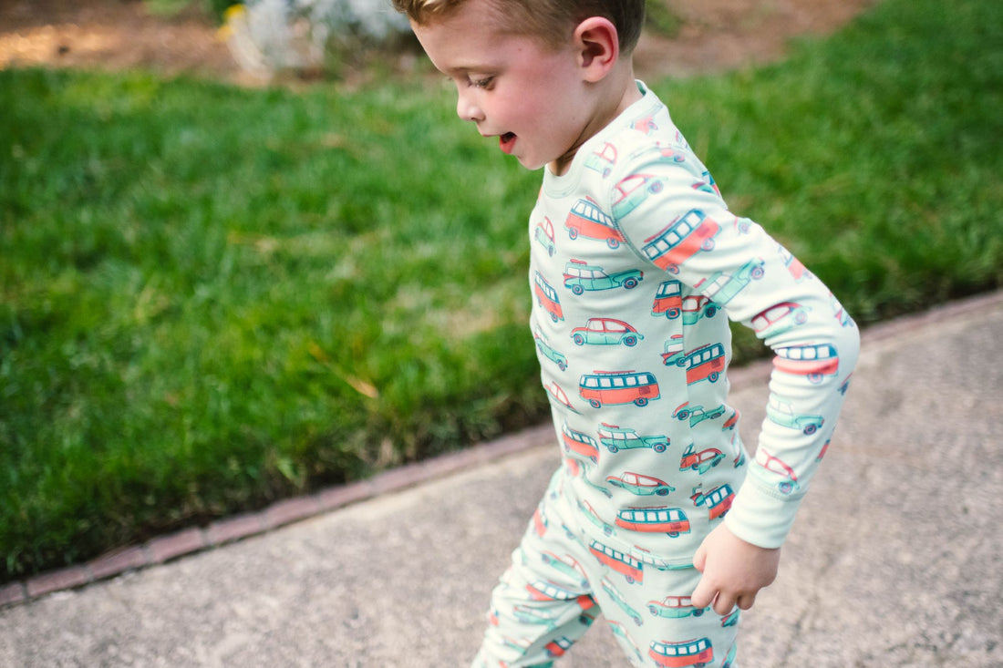 Retro Cars Two Piece Heyward House Boy's Pajama Set Boy Running Outside