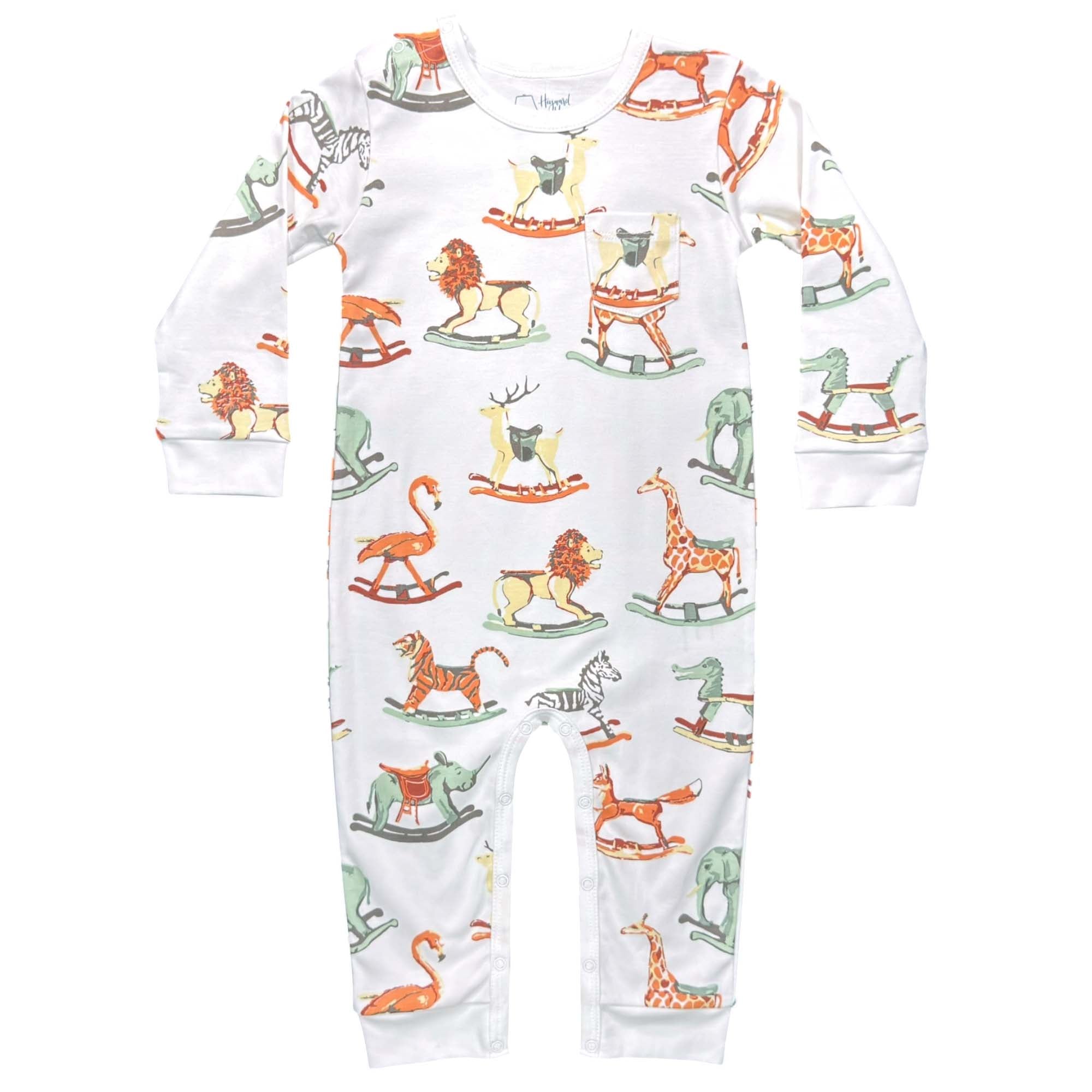 White romper with colorful animal print on a white background