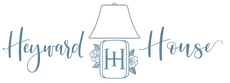 Heyward House Centered logo with lamp icon in the middle