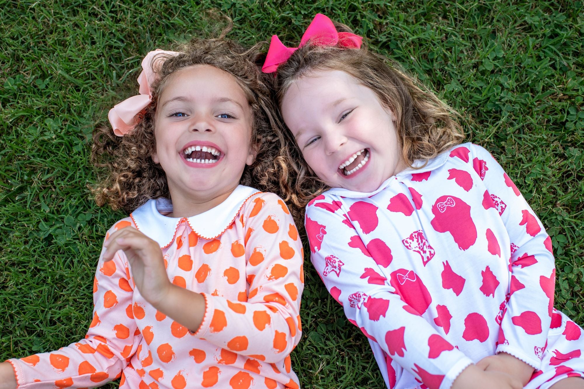 Little Girls Laughing in Heyward House Pink Dog Pattern Pocket Twirl Dress