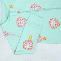 Detail of zipper area of pink pajama with hot air balloon pattern made in pima cotton