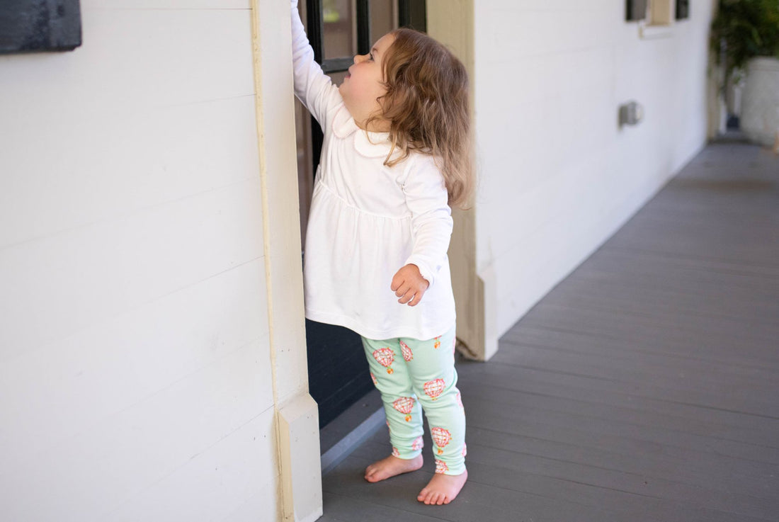 Little Girl wearing Heyward House Pink Hot Air Balloon Leggings