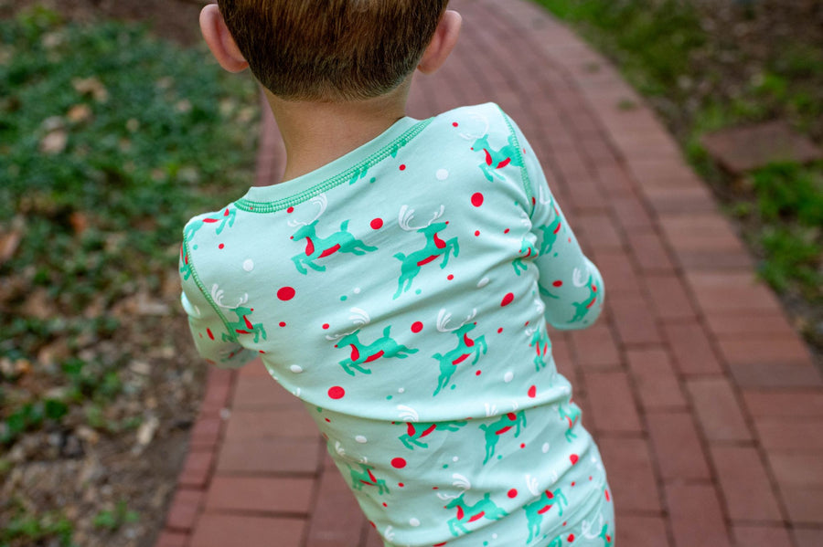 Mint green two-piece pajama set with vintage Christmas reindeer pattern made with pima cotton with details 