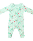 Front view of Heyward House girls playsuit with ruffle collar and green retro reindeer pattern in pima cotton