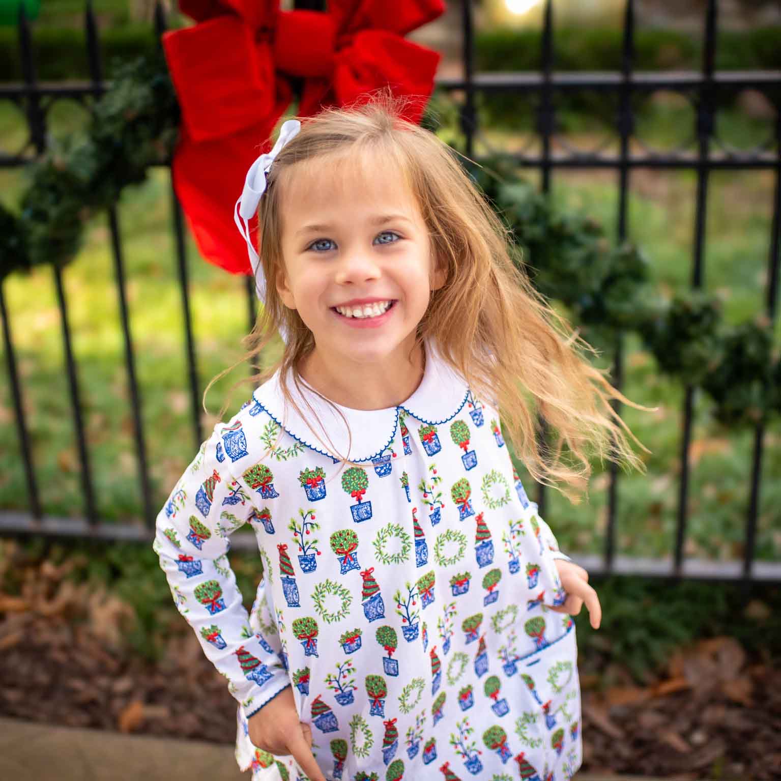 little girl wearing Heyward House Christmas dress for a special occasion