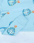 Detail of zipper area of Light blue footed pajama with hot air balloon pattern made in pima cotton