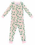 Pink two-piece pajama set with vintage Christmas holly pattern made with pima cotton