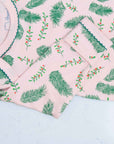 Pink gown with Vintage Christmas Holly pattern with scratch preventer detail view