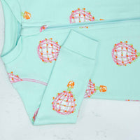 Detail of zipper area of pink footed pajama with hot air balloon pattern made in pima cotton