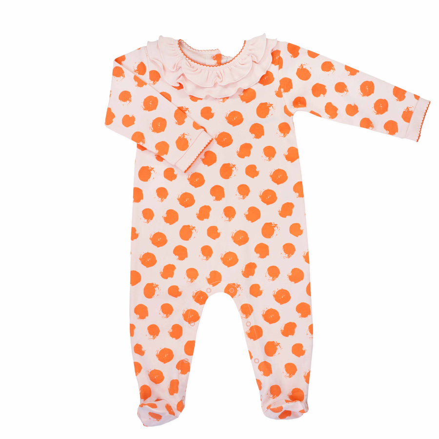 pink girls playsuit with classic ruffled collar and orange dots pattern made in pima cotton