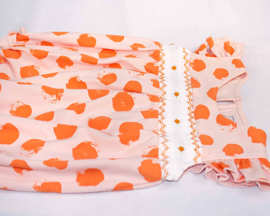 another detailed view pink girls bubble with smock and orange dots pattern made in pima cotton