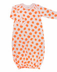 Pink gown with orange polka dot pattern made with pima cotton